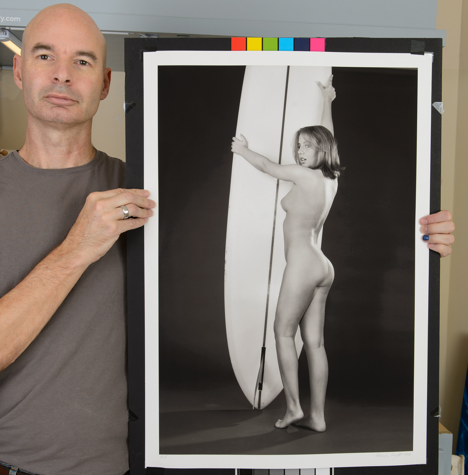 Artist with artwork