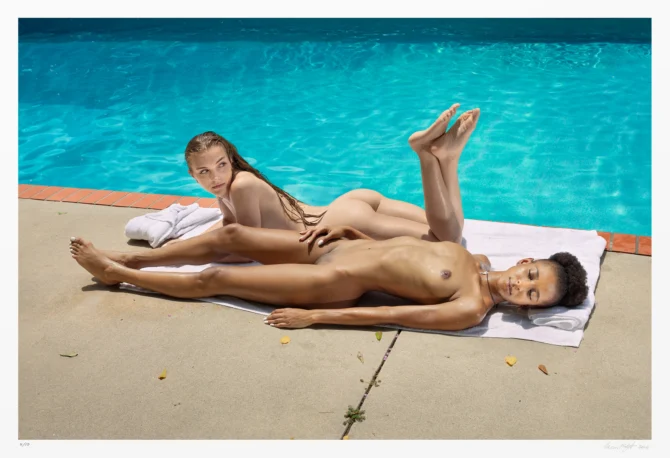 This colorful pinup photograph embodies hedonism and abundance through it’s saturated colors, sensual subjects, and manifest body positions. Two lean, striking women lay in the center of a picturesque swimming pool display.